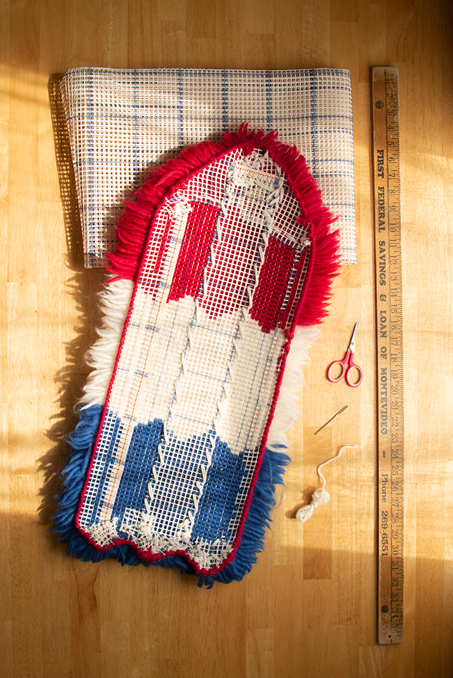 Learn how to make this bomb popsicle-inspired latch hook wall hanging with a free pattern and tutorial from Hands Occupied.