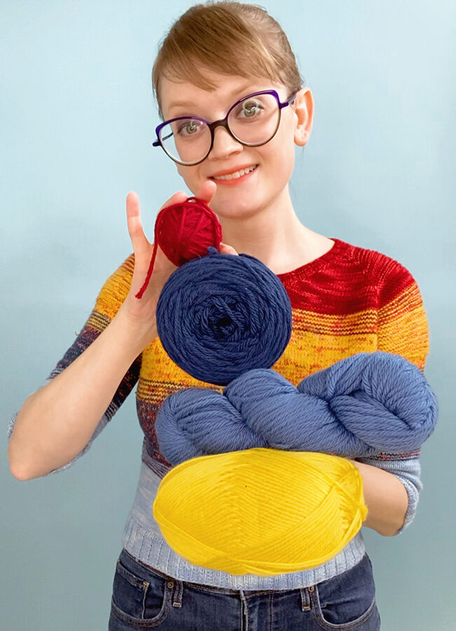 A still from the new @handsoccupied TikTok page, specifically a video explaining the different names for yarn balls.