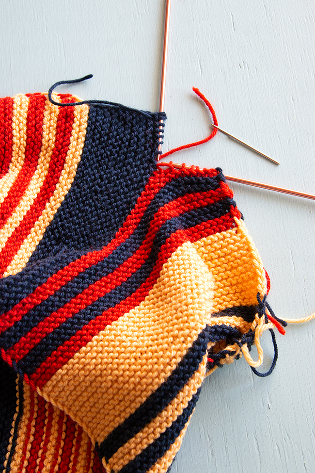 Join two pieces of garter stitch knitting invisibly with the kitchener stitch  - learn how to do garter kitchener stitch. (with video!)